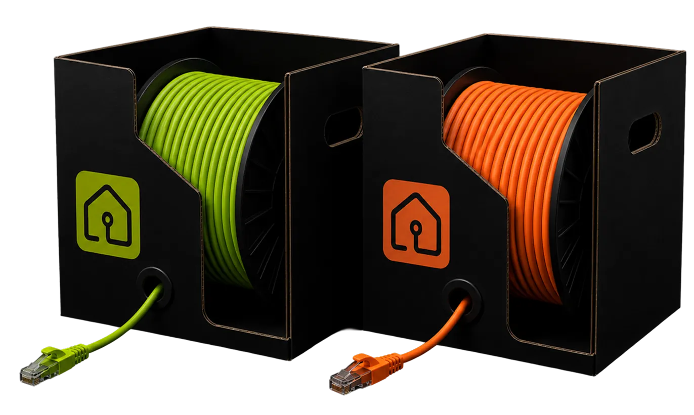 Deux tourets de câble aux couleurs IBT, vert et orange, avec leurs connecteurs RJ45.