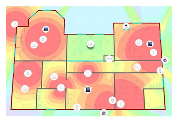 Étude de couverture radio superposée au plan : zones de portée calculées pièce par pièce avant la rédaction du descriptif.